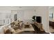 Comfortable upstairs living room with cozy seating, natural light, and stylish decor elements at 2672 Mystere Ct, Las Vegas, NV 89117