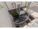 Metal spiral staircase leading to the roof of the home at 2672 Mystere Ct, Las Vegas, NV 89117