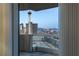Balcony view featuring the iconic Sahara Hotel and city skyline through sliding glass doors at 2777 Paradise Rd # 1105, Las Vegas, NV 89109