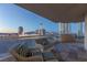Spacious balcony with comfortable seating and stunning views of the city skyline at 2777 Paradise Rd # 1105, Las Vegas, NV 89109