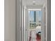 City view from bedroom hallway with floor to ceiling windows and hardwood floors at 2777 Paradise Rd # 1105, Las Vegas, NV 89109