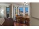 Open-concept living room and dining area with city views from floor to ceiling windows at 2777 Paradise Rd # 1105, Las Vegas, NV 89109