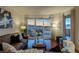 Elegant living room featuring hardwood floors and stunning city views from the balcony at 2777 Paradise Rd # 1105, Las Vegas, NV 89109