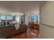 Open concept living and dining area with hardwood floors and city views from floor-to-ceiling windows at 2777 Paradise Rd # 1105, Las Vegas, NV 89109