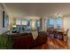 Open concept living and dining area with hardwood floors and city views from the expansive windows at 2777 Paradise Rd # 1105, Las Vegas, NV 89109