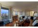 Spacious living room flows into the dining area with city views, and comfortable leather seating at 2777 Paradise Rd # 1105, Las Vegas, NV 89109