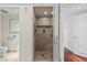 Modern shower room with glass door, tiled walls, rain shower head, and built-in bench at 2777 Paradise Rd # 1105, Las Vegas, NV 89109