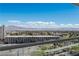 Mountain views and city views from this condo's balcony overlooking lush trees and greenery at 2777 Paradise Rd # 1105, Las Vegas, NV 89109
