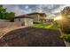 Large backyard with lush green grass, modern pool, spa, and outdoor kitchen area at 2900 Valvent Ct, Henderson, NV 89044