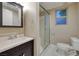 Full bathroom with a vanity sink, framed mirror and shower with glass door at 2900 Valvent Ct, Henderson, NV 89044