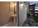 Outdoor bathroom featuring a pedestal sink and adjacent outdoor shower at 2900 Valvent Ct, Henderson, NV 89044