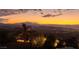 Scenic sunset view overlooking the city lights and mountains from the backyard at 2900 Valvent Ct, Henderson, NV 89044