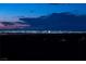 Stunning night view overlooking the illuminated city skyline from an elevated vantage point at 2900 Valvent Ct, Henderson, NV 89044