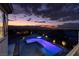 Beautiful view of the pool area with sunset in the background at 2900 Valvent Ct, Henderson, NV 89044