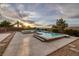 Sparkling swimming pool and spa with ample deck space, perfect for relaxing and soaking up the sun at 2900 Valvent Ct, Henderson, NV 89044