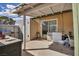 Backyard featuring a covered patio with ample space for outdoor dining and entertaining at 301 E Van Wagenen St, Henderson, NV 89015