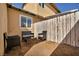 Cozy backyard seating area with a small patio, creating a relaxing outdoor retreat at 301 E Van Wagenen St, Henderson, NV 89015