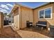 Cozy backyard patio featuring outdoor seating and a grill, perfect for entertaining at 301 E Van Wagenen St, Henderson, NV 89015
