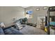 Versatile room currently configured as a pet space, featuring a comfortable seating area and plenty of natural light at 301 E Van Wagenen St, Henderson, NV 89015