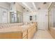This bathroom features double sinks, ample counter space, a large mirror, and a glass-enclosed shower at 304 Cambrian Ridge Ct, Las Vegas, NV 89144
