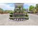 Canyon Terrace gated community entrance with colorful flowers, landscaping, and signage at 304 Cambrian Ridge Ct, Las Vegas, NV 89144