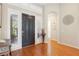Elegant foyer with hardwood floors, neutral paint, and sidelight windows enhancing natural light at 304 Cambrian Ridge Ct, Las Vegas, NV 89144