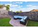 Backyard patio with outdoor seating and artificial turf at 3099 Palmdesert Way, Las Vegas, NV 89120