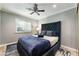 Inviting bedroom with a plush bed, a neutral color scheme, and soft textures at 3099 Palmdesert Way, Las Vegas, NV 89120
