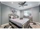 Comfortable bedroom with a modern bed, mirrored dresser, and soft lighting at 3099 Palmdesert Way, Las Vegas, NV 89120