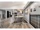 Open dining area with modern chairs, art accents, and easy access to kitchen at 3099 Palmdesert Way, Las Vegas, NV 89120