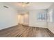 Bright living room featuring modern laminate wood flooring, neutral paint, and natural light at 318 Heather Dr, Henderson, NV 89002
