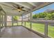 Enclosed, screened lanai overlooks the large, grassy backyard at 318 Heather Dr, Henderson, NV 89002