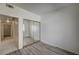 This bedroom features wood-look floors and a closet with mirrored doors at 3400 Cabana Dr # 1068, Las Vegas, NV 89122
