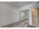 Bedroom featuring hardwood floors and a sliding mirror door closet at 3400 Cabana Dr # 1068, Las Vegas, NV 89122