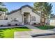 The clubhouse features a well-manicured lawn and desert landscaping, as well as large windows at 3400 Cabana Dr # 1068, Las Vegas, NV 89122