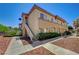 Two-story condo building displaying classic desert architecture, convenient stair access, and carefully landscaped grounds at 3400 Cabana Dr # 1068, Las Vegas, NV 89122