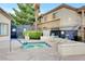 Community hot tub for relaxing, with lounge chairs nearby, located near complex buildings at 3400 Cabana Dr # 1068, Las Vegas, NV 89122