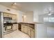 Traditional kitchen with stainless steel appliances open to the living area at 3400 Cabana Dr # 1068, Las Vegas, NV 89122