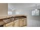 Bright living room featuring a modern ceiling light and marble flooring at 3400 Cabana Dr # 1068, Las Vegas, NV 89122