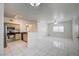 Kitchen adjacent to open-concept living room with lots of natural light at 3400 Cabana Dr # 1068, Las Vegas, NV 89122