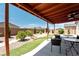 A beautiful outdoor area with a covered patio and desert landscaping at 3543 E Malheur Ave, Pahrump, NV 89061