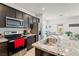 Modern kitchen featuring stainless steel appliances and granite countertops with great lighting at 3543 E Malheur Ave, Pahrump, NV 89061
