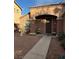 Cozy home featuring a covered front porch and desert landscaping at 3928 Ropers Ranch St, North Las Vegas, NV 89032
