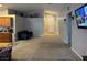 Spacious and bright living room with a neutral color palette and high ceilings at 3928 Ropers Ranch St, North Las Vegas, NV 89032