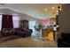 Open concept living room flows into kitchen, perfect for gatherings at 3928 Ropers Ranch St, North Las Vegas, NV 89032