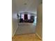 Open living room with high ceilings and access to backyard at 3928 Ropers Ranch St, North Las Vegas, NV 89032