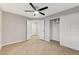 Spacious bedroom with tile flooring, closet, and access to other rooms at 3930 Legend Hills St # 102, Las Vegas, NV 89129