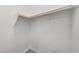 Walk-in closet with shelf and bar for hanging clothes at 3930 Legend Hills St # 102, Las Vegas, NV 89129