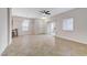 Spacious living area showcasing the sliding door to the exterior patio and connecting to the kitchen at 3930 Legend Hills St # 102, Las Vegas, NV 89129