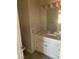 Bathroom with vanity, cabinets, mirror, and modern lighting at 4300 N Lamont St # 249, Las Vegas, NV 89115